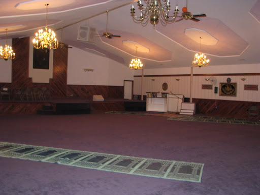 The building used to be a church; although it was built along an East-West grid, the carpets are aligned diagonally so that people may face Mecca, in Saudi Arabia, when they pray. (Photo credit: Jennifer Moore)