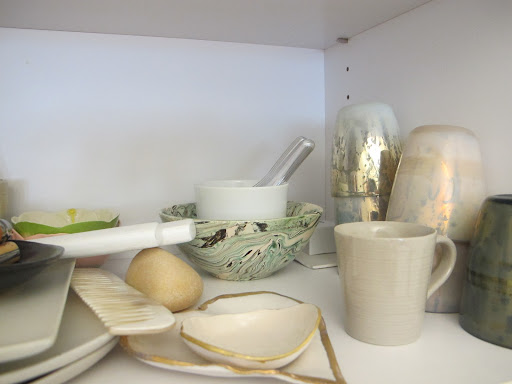 I am dying for the marbled bowl in the back.