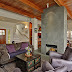 The living room includes entertainment amenities: HDTV, stereo, DVD and piano.