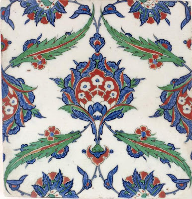Tile | Origin:  Iznik,  Turkey | Period: ca. 1575  Ottoman period | Details:  The ambitious architectural projects sponsored by Suleyman the Magnificent (reigned 1522Â–60) and his ruling elite in the sixteenth century provided the necessary impetus for large-scale production of Iznik tiles. Using certain standardized sizes and shapes, Iznik tiles and three-dimensional objects share many of the same motifs and color combinations. The design for this tile is clearly part of a repeat pattern, which would have animated an interior or exterior surface, much like a curtain or a piece of textile. | Type: Stone-paste body painted under glaze | Size: H: 31.3  W: 30.0   D: 2.4  cm | Museum Code: F2001.15 | Photograph and description taken from Freer and the Sackler (Smithsonian) Museums.