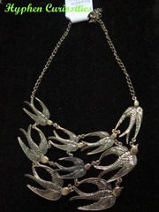 Swallow bib necklace, hyphen