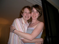Kristy and Mel hug on the balcony.jpg