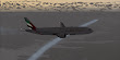 Emirates 77L climbs to cruising altitude high over Texas, while an ExpressJet ERJ passes below