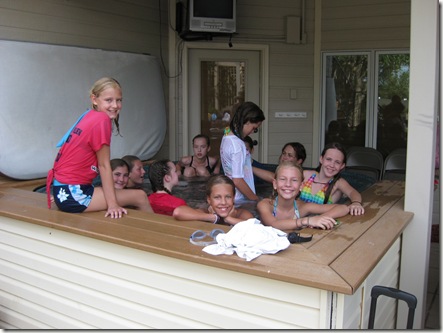 happy kids in hot tub