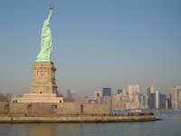 Statue of Liberty with NYC skyline.