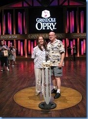 9376 Nashville, Tennessee - Grand Ole Opry - Opry House Backstage Pass Tour - Karen & Bill on the six-foot circle from the stage of the Opry's famous former home, the Ryman Auditorium