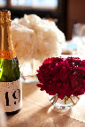 Puffs of my favorite flower, peonies, complemented champagne table numbers.