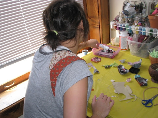 Casey Davis creates new hair fashions.