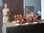 Starting to shoot our table, with candles glowing, and our model ready to walk through the frame.