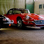 Jaguar E-Type Serie 3 OTS, ohne Scheinwerferabdeckung. Jaguar XK-E, with Head-Light-Cover Kit. The Head-Lamp-Cover Conversion Kit made by designer Stefan Wahl in the tradition of Malcolm Sayer. / Jaguar E-Type mit Scheinwerferabdeckungen, designed und hergestellt von Designer Stefan Wahl in der Tradition von Malcolm Sayer.