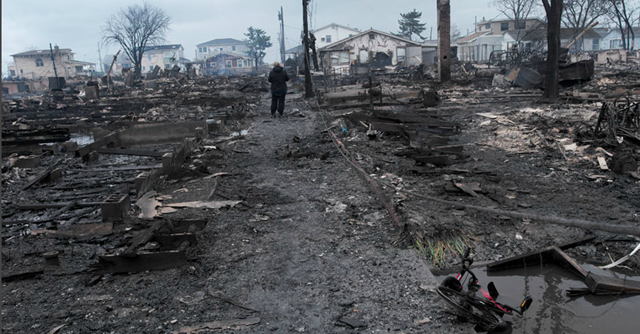 The day after 'super storm' Sandy, the coastal community of Breezy Point, in Far Rockaway, Queens remains devastated by fire and flooding. Andrew Lichtenstein / Corbis