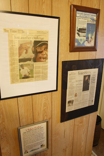 This wall contains newspaper clippings of the hearing impaired who are doing great things in the World. (Photo by: Kenrick Nobles)