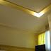 A wide shot of our bedroom with the LCD TV