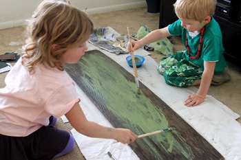 Painting a sign for dad