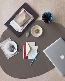 Personalize Mom's desk with a free-form stone-shaped blotter; it's a great way to protect the surface or to designate a writing area. Plus it takes just minutes to make: Outline the shape you want on the back of the leather, and cut it out with heavy-duty scissors
(marthastewart.com) Personalize Mom's desk with a free-form stone-shaped blotter; it's a great way to protect the surface or to designate a writing area. Plus it takes just minutes to make: Outline the shape you want on the back of the leather, and cut it out with heavy-duty scissors
(marthastewart.com)