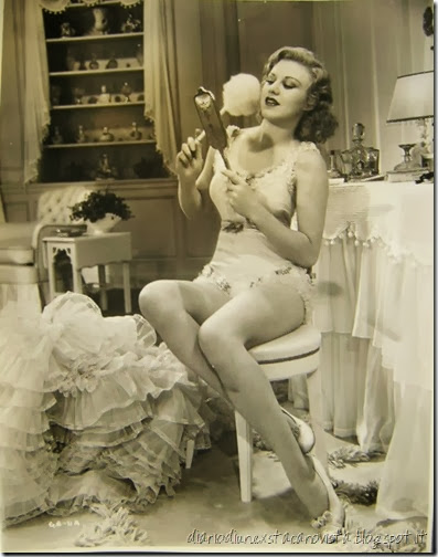 Ginger Rogers powdering her face