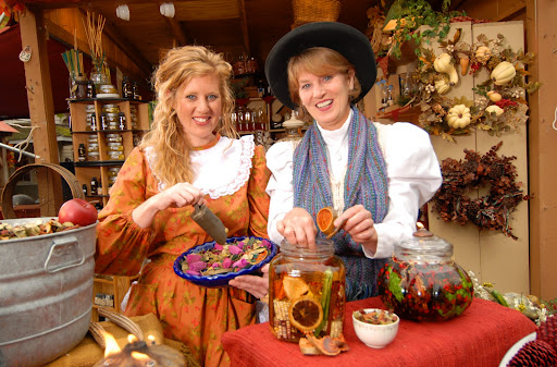 The 'Craft in America' Exhibit will feature handmade items from across the Ozarks and the nation.  Here, DeYon Blase, right, of White River Wildflowers in Hollister makes oil candles with her daughter, Meloney Maggard. (Photo courtesy of Silver Dollar City)