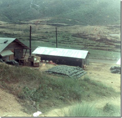 center, supply office-rice paddies in bkgrnd where R engaged enemy Feb 23 1969