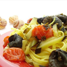 Saffron Tagliarini With Snails, Sorrel, Tomato, Zucchini