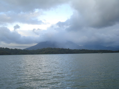 That's as much of Volcano Arenal as we'd ever see.  Even on the sunniest of the three days we spent at its feet, there was a cloud fixed to the volcano.  I am told it's twice as high as that.