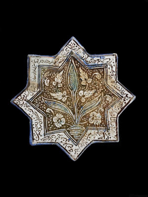 Eight-pointed Star Tile | Origin:  Iran | Period: early 14th century  Il-Khanid period | Details:  Not Available | Type: Stone-paste painted colorless glaze | Size: H: 21.0  W: 21.3  cm | Museum Code: F1973.16 | Photograph and description taken from Freer and the Sackler (Smithsonian) Museums.