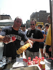 Here's Wade seasoning a piping-hot chip on a stick for an eager customer.