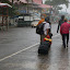 What you probably don't notice at first is that the little red thing on the guy's suitcase is actually his little kid riding it like a motorcycle.
