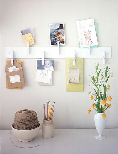 This clothespin organizer is easy to make–just attach pins to a piece of wood and mount to the wall. Pin up small items like postcards, invitations, and business cards that might get lost otherwise. This clothespin organizer is easy to make–just attach pins to a piece of wood and mount to the wall. Pin up small items like postcards, invitations, and business cards that might get lost otherwise.