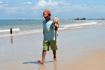 Child beach vendor, Trancoso, Brazil