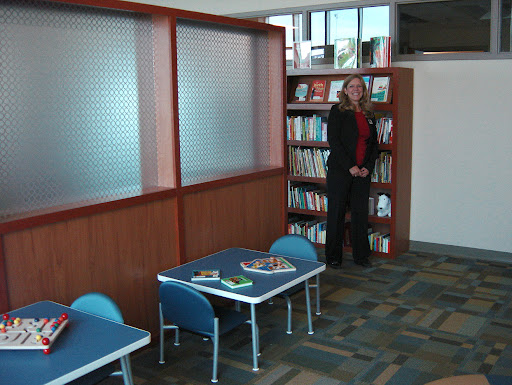 The Center's Celeste Skidmore brings the tour to the children's waiting area. (photo credit: Sam Senovich)