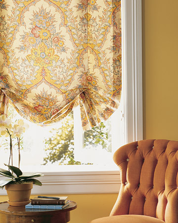 Deep-bottom pleats and a patterned fabric give this shade an elegance suited to traditional rooms. It's designed to remain partially raised, accentuating its lovely form. Deep-bottom pleats and a patterned fabric give this shade an elegance suited to traditional rooms. It's designed to remain partially raised, accentuating its lovely form.