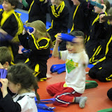 Eidan, wiping sweat on his new belt