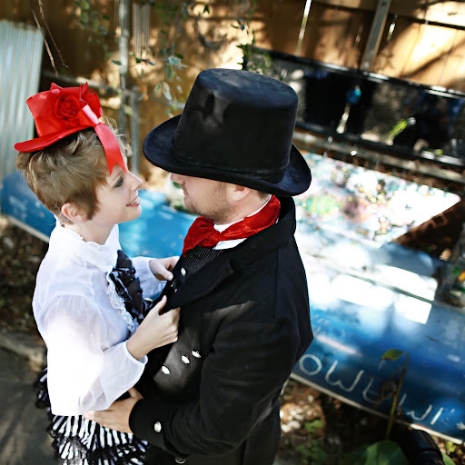 The couple embrace with the sound of drums in the background. The couple embrace with the sound of drums in the background.