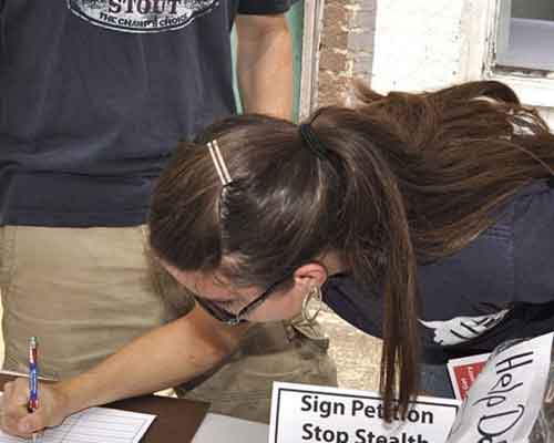 guest signs our petition for property tax votes to be held in November