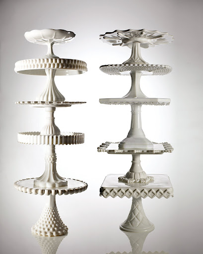 Many dazzling designs of dessert stands are avilable for less than $100. The largest versions (once used in window displays of bake shops) are rare and often more expensive, as are colored stands. Vibrant shades didn't crop up until the 1870's, when eye-catching hues grew trendy in home decor and the demand for colored glassware followed. Many dazzling designs of dessert stands are avilable for less than $100. The largest versions (once used in window displays of bake shops) are rare and often more expensive, as are colored stands. Vibrant shades didn't crop up until the 1870's, when eye-catching hues grew trendy in home decor and the demand for colored glassware followed.
