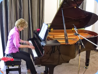 Denise Gunson playing the Yamaha C3 grand piano