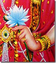 Sita Devi holding lotus flower