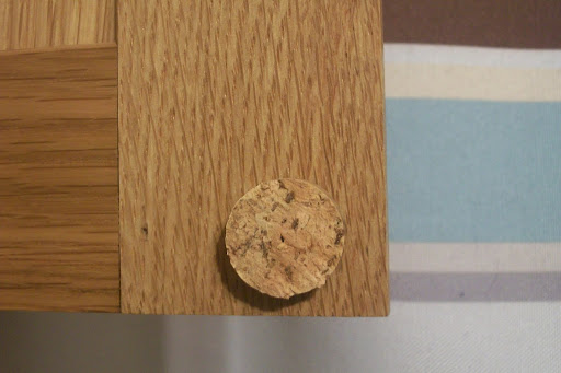 Use your cork as a cabinet bumper.