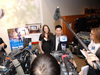 Brad and Ashley, the first buyers of Panasonic's Full HD 3D Home Theater System, are interviewed by the media at the Best Buy in NYC's Union Square.