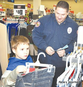 2 col Troy Thomas helps Josh Jewell.jpg