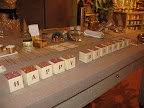 Glittered Letter boxes spelling out Happy Birthday. 
The Classic Cube boxes from B.T. elements, www.btelements.com

-         MS Crafts Copper Glittered Alphabet Letters from www.michaels.com for stores) There is enough in a package to spell Happy Birthday!

Fine glitter, by Martha Stewart Crafts, www.michaels.com for stores