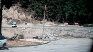Washed out section of road on the Pan Am Highway. There were a muber of these, as the highway is cut into steep clay hillsides in most places. Photos by TOM HART