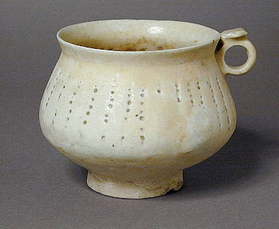 Tankard Iran Tankard, late 12th or 13th century Ceramic; Vessel, Fritware, pierced, glazed, 4 3/16 x 3 5/16 in. (10.7 x 8.4 cm) The Nasli M. Heeramaneck Collection, gift of Joan Palevsky (M.73.5.146) Art of the Middle East: Islamic Department.