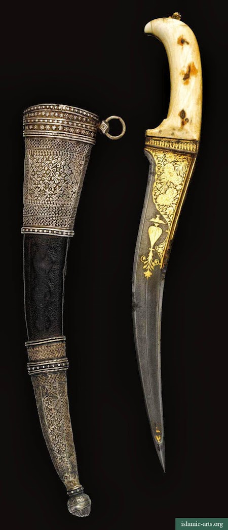 AN IVORY-HILTED DAGGER WITH SILVER-MOUNTED SCABBARD, INDIA