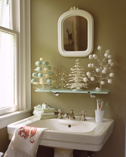 Two of the plastic trees are as useful as they are unexpected: the one on the left, intended to hold candies, now serves as a soapdish; the one on the right keeps cotton balls at hand. Two of the plastic trees are as useful as they are unexpected: the one on the left, intended to hold candies, now serves as a soapdish; the one on the right keeps cotton balls at hand.