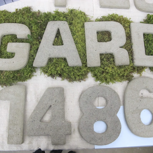 These fantastic concrete numbers made by Andrea Mason from TV would look great with a modernist home.