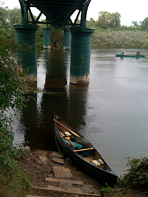 Stopped under an old iron pontoon bridge, 'WWII style' and got the Kelly fired up again, wet-through, we needed more hot tea....