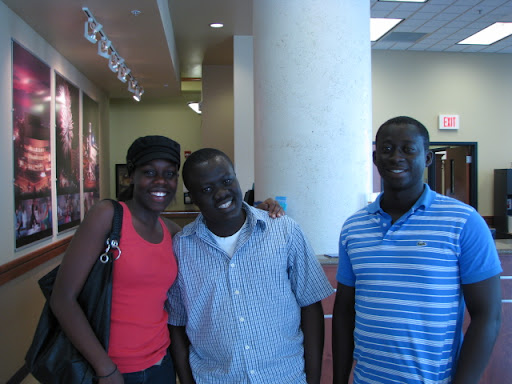 Kobe Sarpong, from Ghana, poses with two friends. In Ghana, he says, neighbors play a role in raising--and disciplining--the neighborhood children. (photo credit: Sam Senovich)