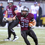 Dan Moore looks for a hole in the UNI defense.
