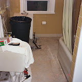 The slab under the tile. I removed the old tile with a rubber mallet and brick chisel.
